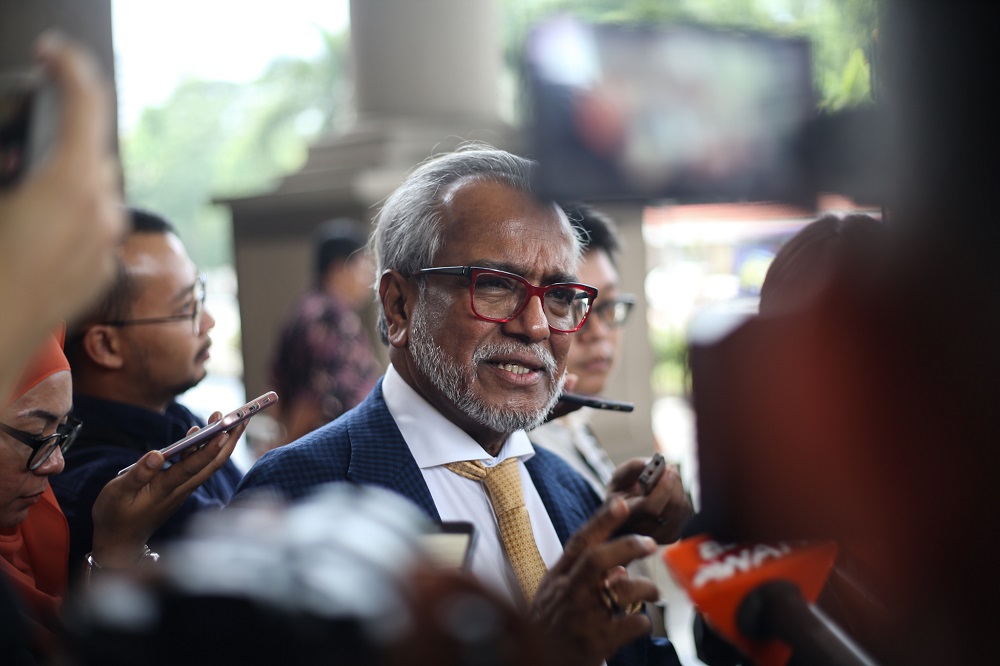Lawyer Tan Sri Muhammad Shafee Abdullah speaks to reporters at the Kuala Lumpur Court Complex April 18, 2019. u00e2u20acu201d Picture by Ahmad Zamzahuri
