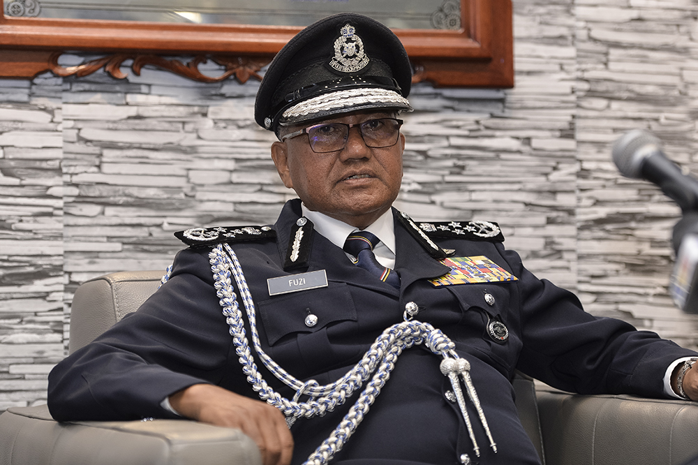 Inspector-General of Police, Tan Sri Datuk Seri Mohamad Fuzi Harun, speaks during a press conference at the launch of the Brickfields District Police Headquarter in Kuala Lumpur April 29, 2019. u00e2u20acu201d Picture by Miera Zulyana
