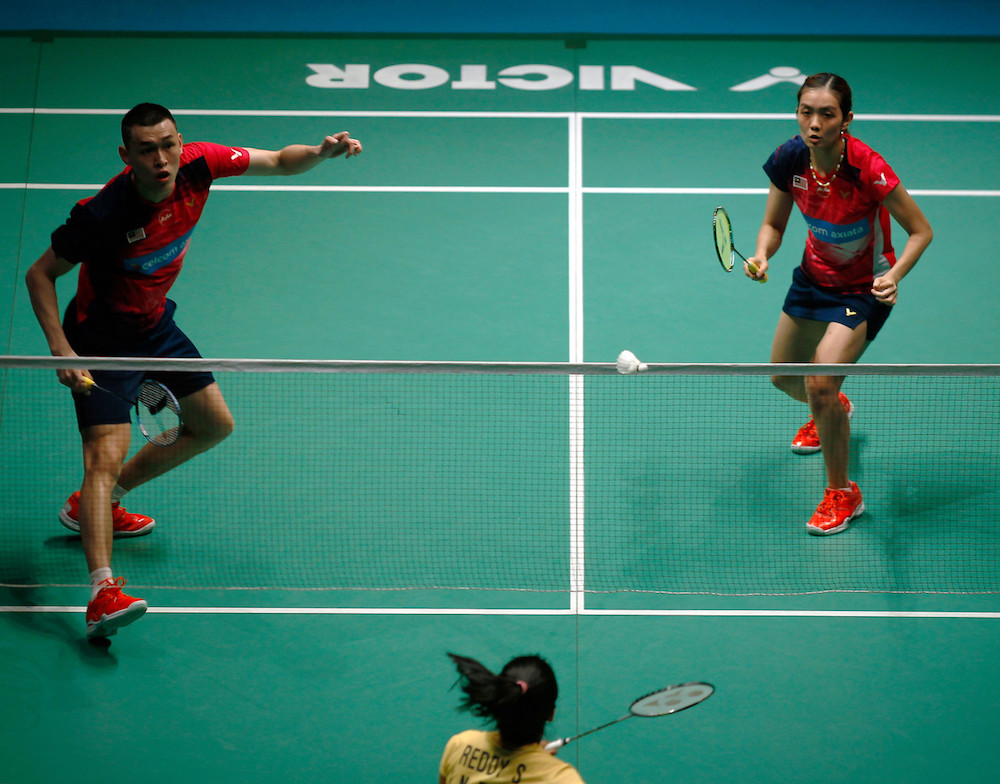 Malaysiau00e2u20acu2122s Tan Kian Meng and Lai Pei Jing in action at the 2019 Malaysian Open at Axiata Arena in Bukit Jalil April 4, 2019. u00e2u20acu201d Bernama pic