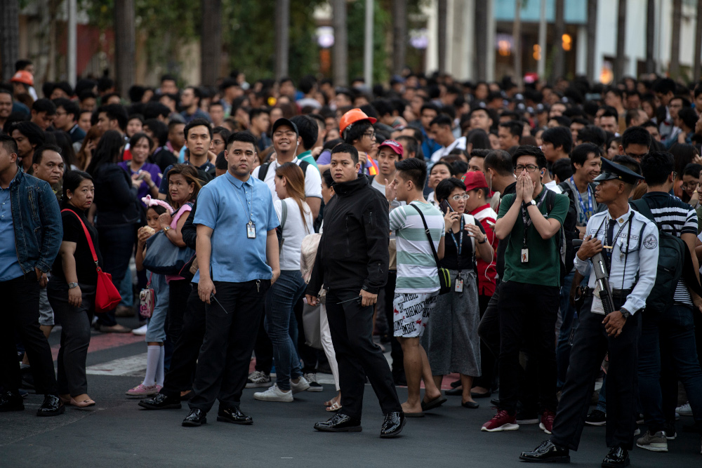 Employees are seen at an open area in Manila, after an earthquake rocked the Philippines April 22, 2019. A powerful earthquake rocked the Philippines, sending thousands of people fleeing high-rises in Manila as buildings shook. u00e2u20acu201d AFP pic 