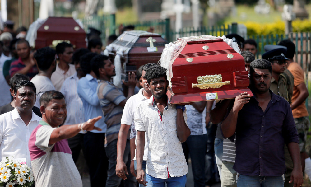 Coffins of victims are carried during a mass for victims, two days after a string of suicide bomb attacks on churches and luxury hotels across the island on Easter Sunday, in Colombo, Sri Lanka April 23, 2019. u00e2u20acu201d Reuters pic