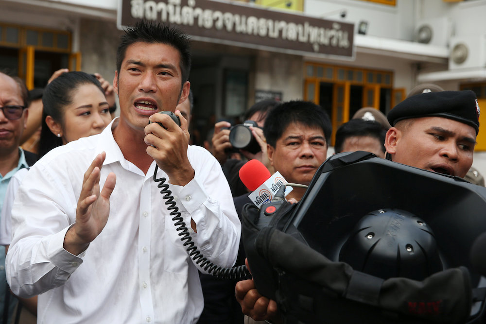Thanathorn Juangroongruangkit, leader of the Future Forward Party speaks to his supporters as he arrives at a police station to hear a sedition complaint filed by the army in Bangkok, Thailand, April 6, 2019. u00e2u20acu201d Reuters pic