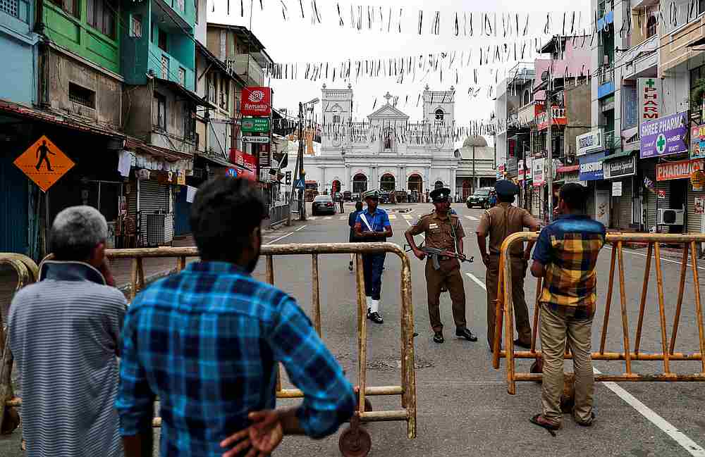 People stand near a security barricade in front of St Anthony's Shrine, days after a string of suicide bomb attacks across the island on Easter Sunday, in Colombo, Sri Lanka April 29, 2019. u00e2u20acu201d Reuters pic