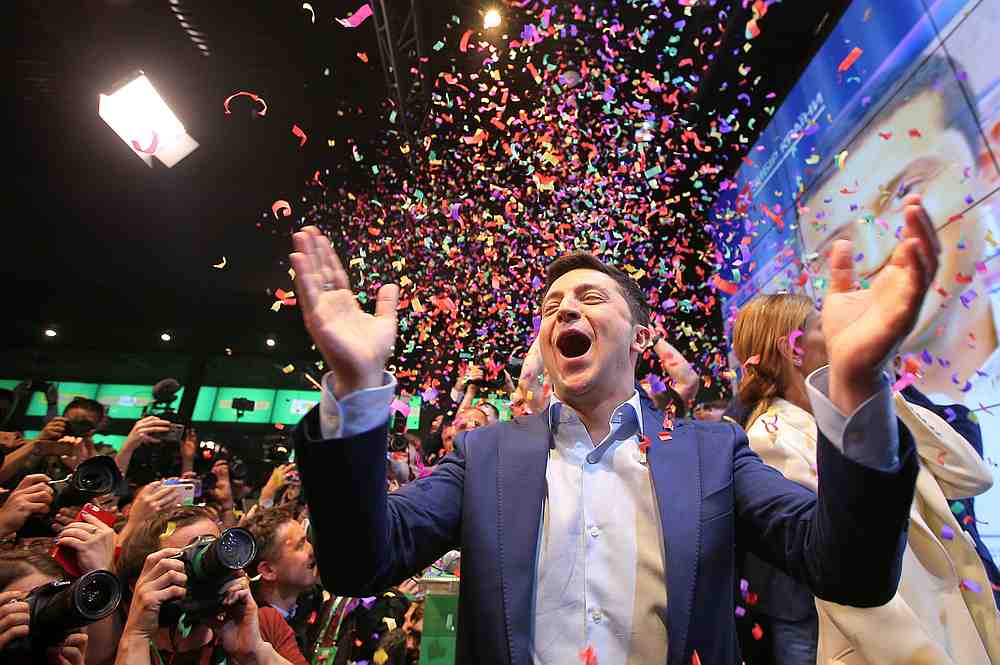 Ukrainian presidential candidate Volodymyr Zelenskiy reacts following the announcement of the first exit poll in a presidential election at his campaign headquarters in Kiev April 21, 2019. u00e2u20acu201d Reuters pic