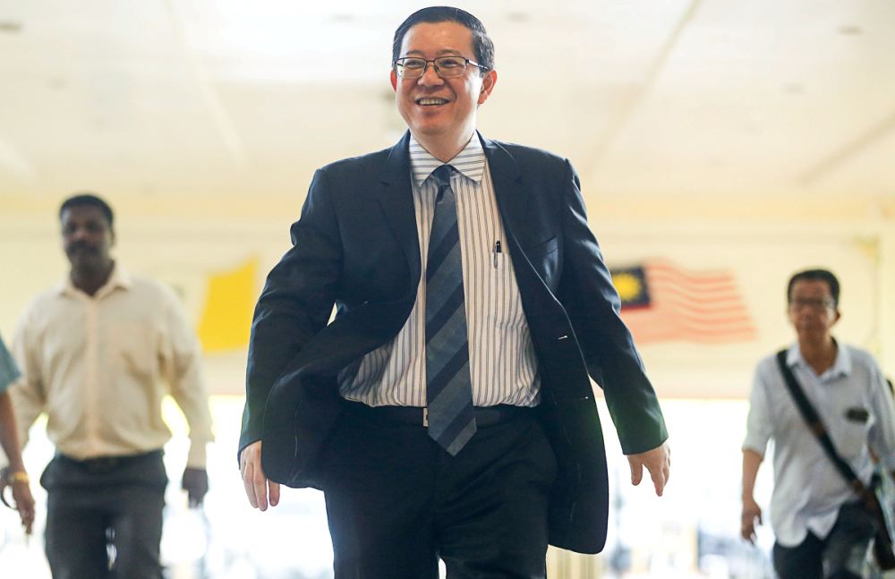 Finance Minister Lim Guan Eng is seen arriving at the the 14th Penang State Assembly session at Dewan Sri Pinang in George Town April 30, 2019. u00e2u20acu2022 Picture by Sayuti Zainudin