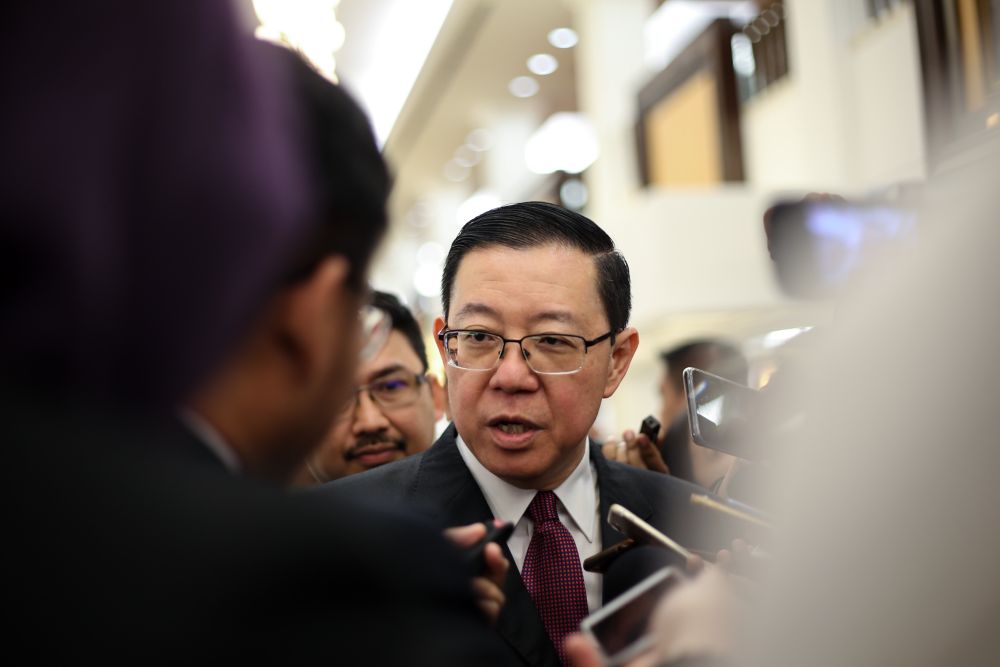 Finance Minister Lim Guan Eng speaks to reporters at the Parliament lobby April 2, 2019. u00e2u20acu201d Picture by Ahmad Zamzahuri