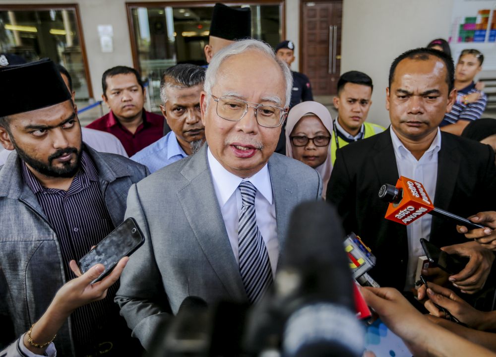 Datuk Seri Najib Razak speaks to reporters outside the Kuala Lumpur Court Complex April 16, 2019. u00e2u20acu201d Picture by Firdaus Latif