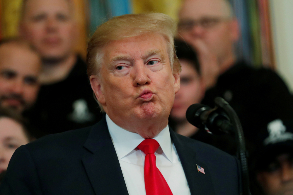 US President Donald Trump reacts as he speaks at the Wounded Warrior Project Soldier Ride event after the release of Special Counsel Robert Muelleru00e2u20acu2122s report, in the East Room of the White House in Washington April 18, 2019. u00e2u20acu201d Reuters pic