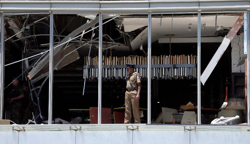 A police officer inspects the explosion area at Shangri-La hotel in Colombo April 21, 2019. u00e2u20acu201d Reuters pic