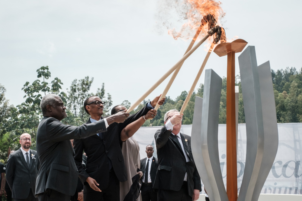 (From left) African Union chief Moussa Faki, Rwandau00e2u20acu2122s President Paul Kagame, his wife Jeannette, and EU President Jean-Claude Juncker light a remembrance flame at the Kigali Genocide Memorial in Kigali, Rwanda April 7, 2019. u00e2u20acu201d AFP pic 