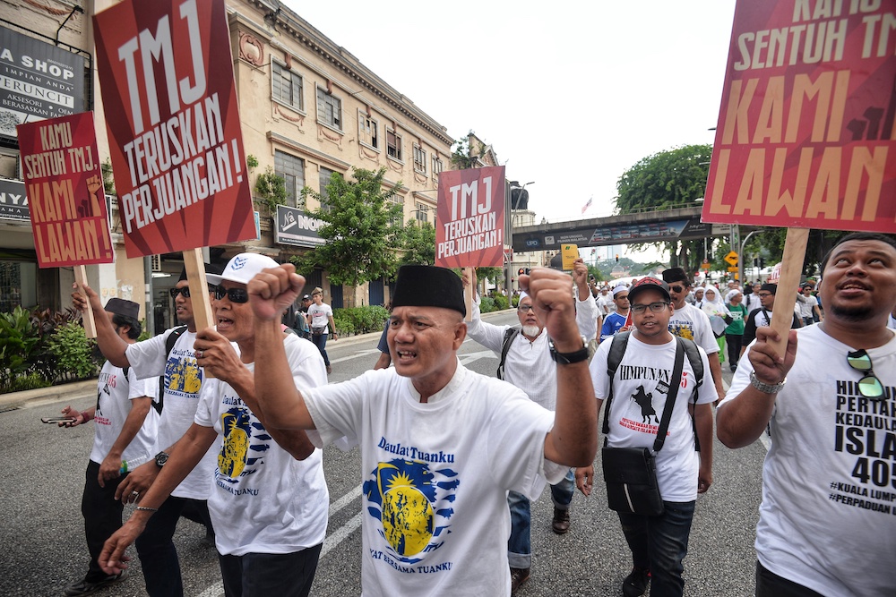 Participants carrying placards and shouting slogans take part in the Ummah rally in Kuala Lumpur May 4, 2019. u00e2u20acu201d Picture by Shafwan Zaidon 