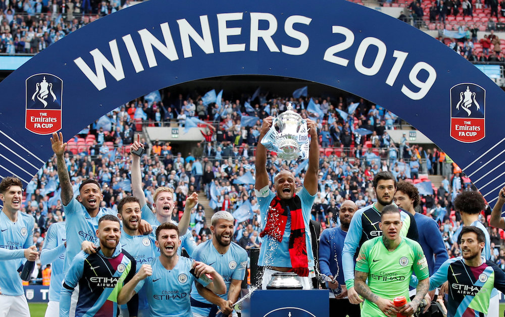 Manchester City celebrate with the trophy after winning the FA Cup Final at Wembley Stadium in London May 18, 2019. u00e2u20acu201d Reuters pic