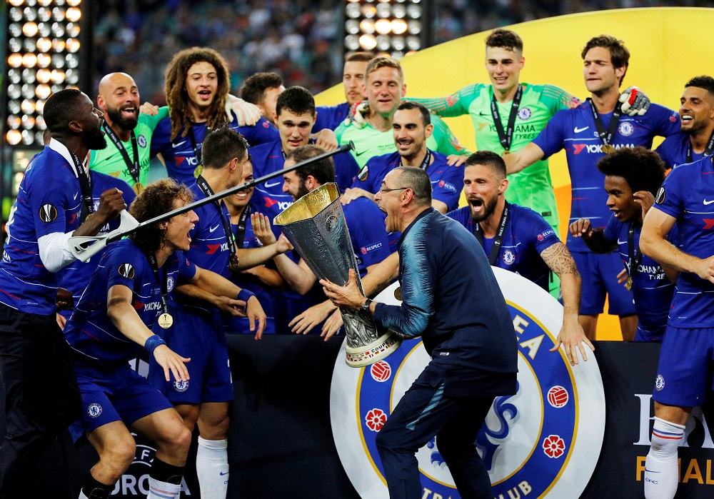 Chelsea manager Maurizio Sarri celebrates winning the Europa League with the trophy and their players at the Baku Olympic Stadium in Azerbaijan May 29, 2019. u00e2u20acu201d Reuters pic