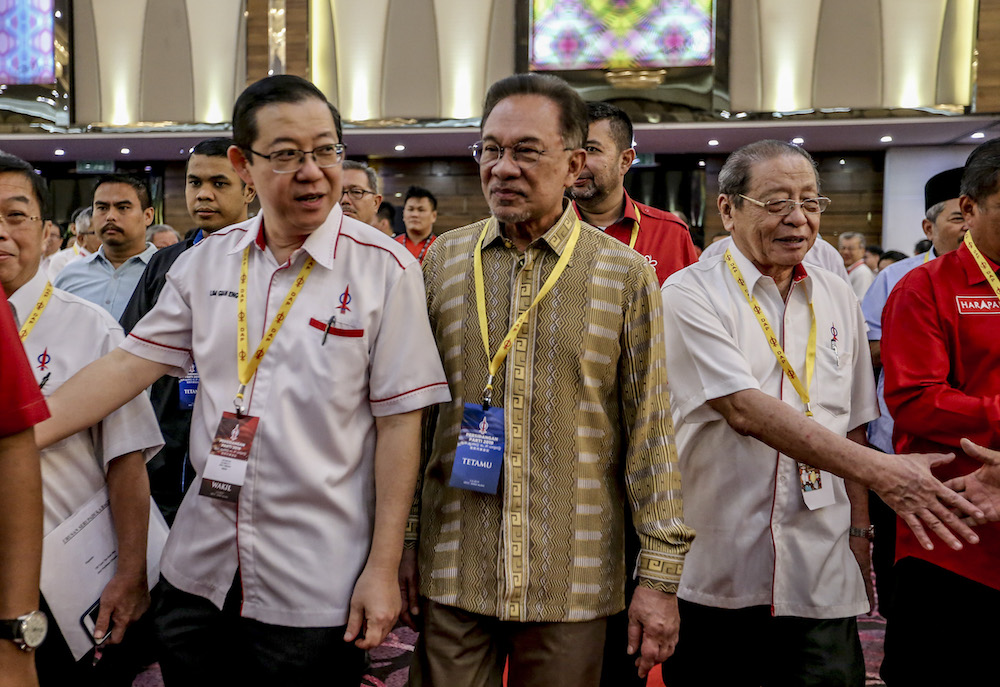 Lim Guan Eng, Datuk Seri Anwar Ibrahim and Lim Kit Siang attend the 2019 DAP National Conference in Shah Alam May 5, 2019. u00e2u20acu201d Picture by Firdaus Latif
