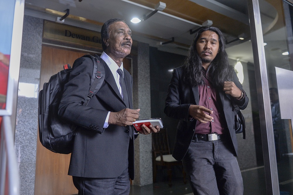 Former journalist from Malay Mailu00e2u20acu2122s Penang bureau, Arulldas Sinnappan, and Malay Mail photographer Sayuti Zainudin attend the Wang Kelian Royal Commission of Inquiry as witnesses in Putrajaya May 8, 2019. u00e2u20acu201d Picture by Mukhriz Hazim