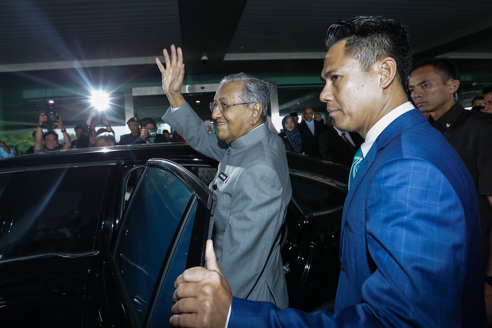 Prime Minister Tun Dr Mahathir Mohamad leaves PICC in Putrajaya May 9, 2019, after delivering his keynote address on the first anniversary of Pakatan Harapan as the government. u00e2u20acu201d Picture by Ahmad Zamzahuri