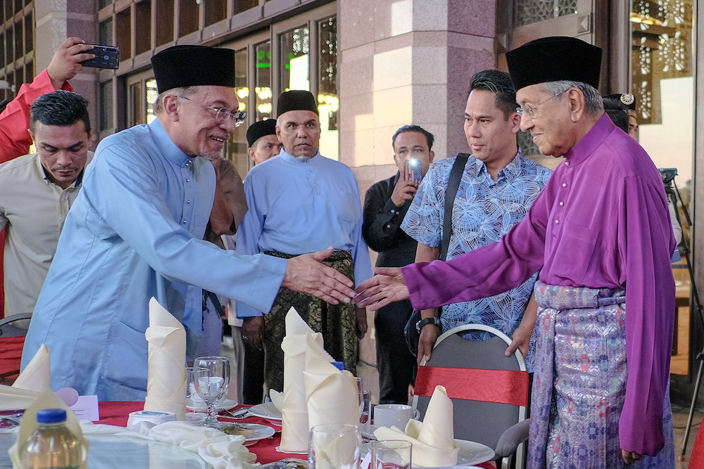 Prime Minister Tun Dr Mahathir Mohamad greets Datuk Seri Anwar Ibrahim before special thanksgiving prayers and iftar in Putrajaya May 9, 2019. u00e2u20acu201d Picture by Mukhriz Hazim