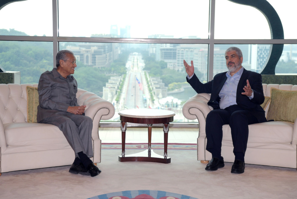 Prime Minister Tun Dr Mahathir Mohamad speaks to former Hamas chairman Khalid Meshaal at Perdana Putra May 22, 2019. u00e2u20acu201d Bernama pic 