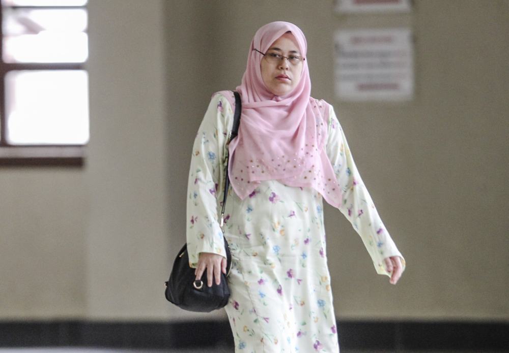 Head of Members of Parliament Affair Division at the Secretariat of Parliament of Malaysia, Farah Nurdiana Azhar, is pictured at the Kuala Lumpur High Court Complex May 2, 2019. u00e2u20acu2022 Picture by Firdaus Latif