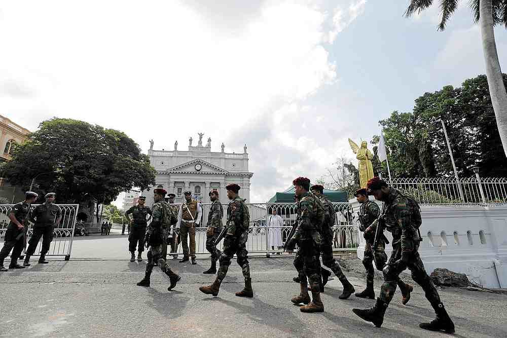 Sri Lanka's commando soldiers keep security at a special mass for those who lost their lives in Sri Lanka's Easter Sunday bombing, in Colombo, Sri Lanka May 11, 2019. u00e2u20acu201d Reuters pic