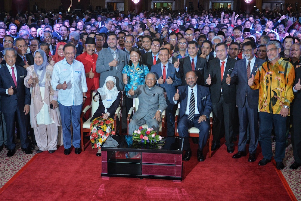 Prime Minister Tun Dr Mahathir Mohamad takes a group photo with ministers and Pakatan Harapan leaders in Putrajaya May 9, 2019. u00e2u20acu201d Picture by Shafwan Zaidon