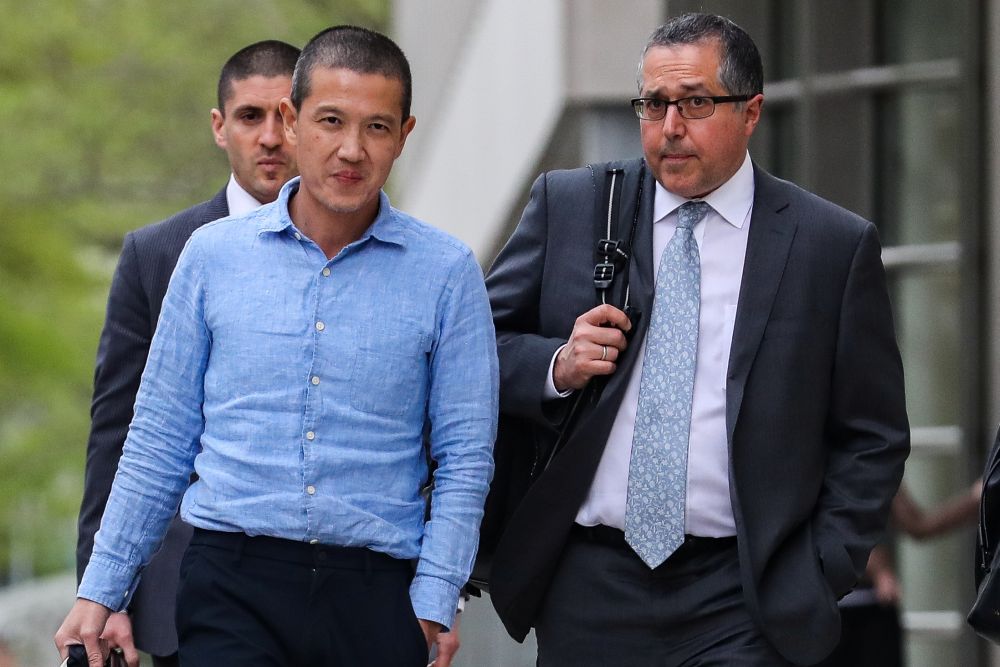 Ex-Goldman Sachs banker Roger Ng (left) and his lawyer Marc Agnifilo leave the federal court in New York May 6, 2019. u00e2u20acu201d Reuters pic