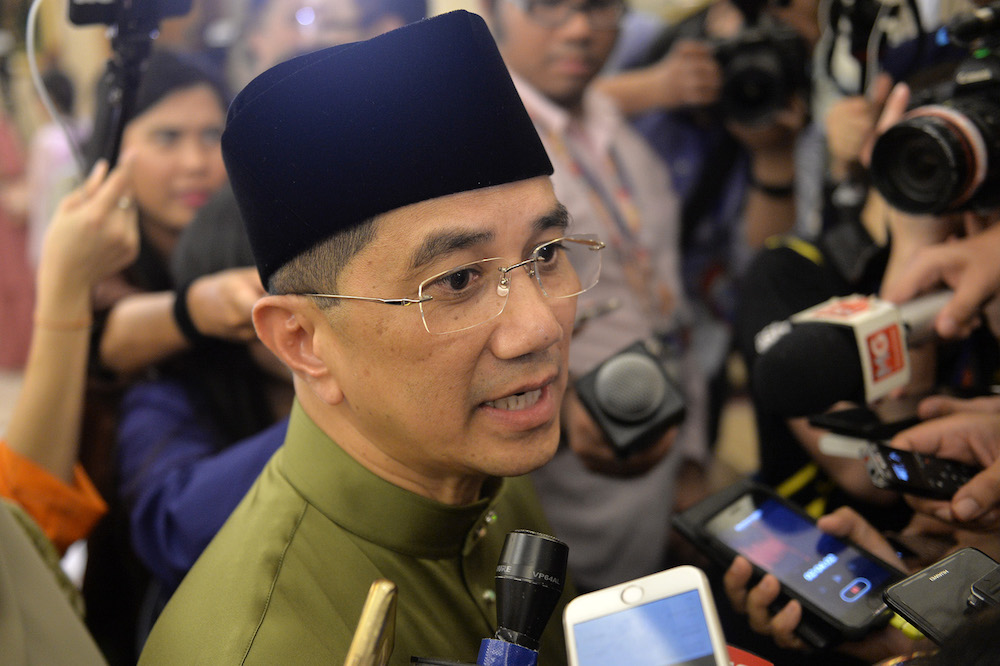 Economic Affairs Minister Datuk Seri Azmin Ali speaks to reporters during the Prime Ministeru00e2u20acu2122s Raya Open House at Seri Perdana in Putrajaya June 5, 2019. u00e2u20acu201d Picture by Mukhriz Hazim