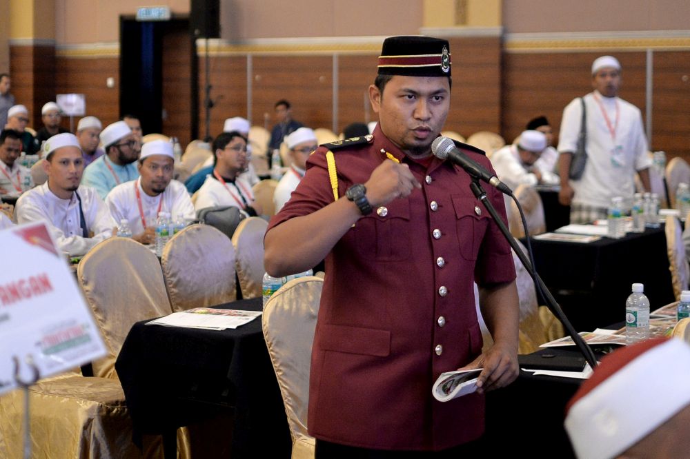 PAS Youth delegate Amirul Jufry speaks during Muktamar 2019 in Gambang, Pahang June 19, 2019. u00e2u20acu201d Picture by Mukhriz Hazim