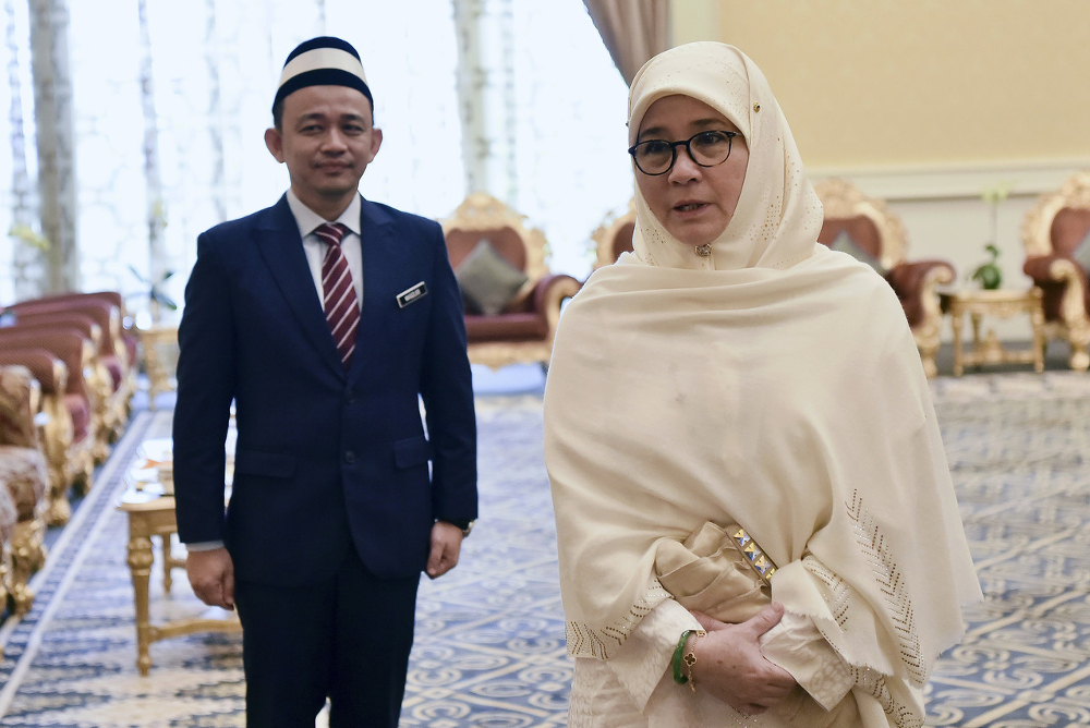 Raja Permaisuri Agong Tunku Azizah Aminah Maimunah Iskandariah and Education Minister Maszlee Malik at Istana Negara June 17, 2019. u00e2u20acu201d Bernama pic