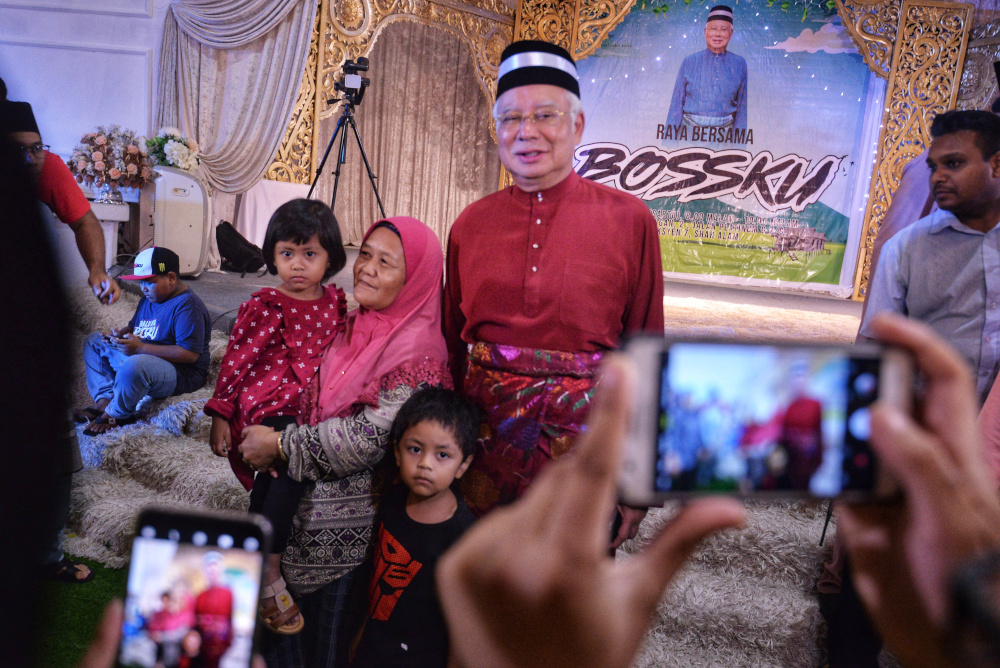 Former prime minister Datuk Seri Najib Razak greeting visitors at his Hari Raya Open House at Laman Kayangan, Shah Alam June 29, 2019. u00e2u20acu201d Picture by Shafwan Zaidon