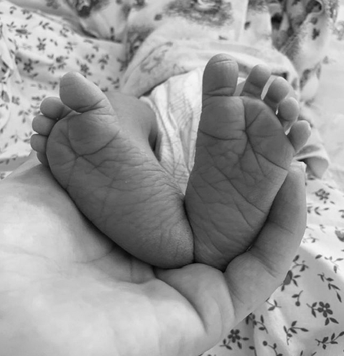 Voevodina posted earlier today a picture of a pair of baby feet on Instagram.