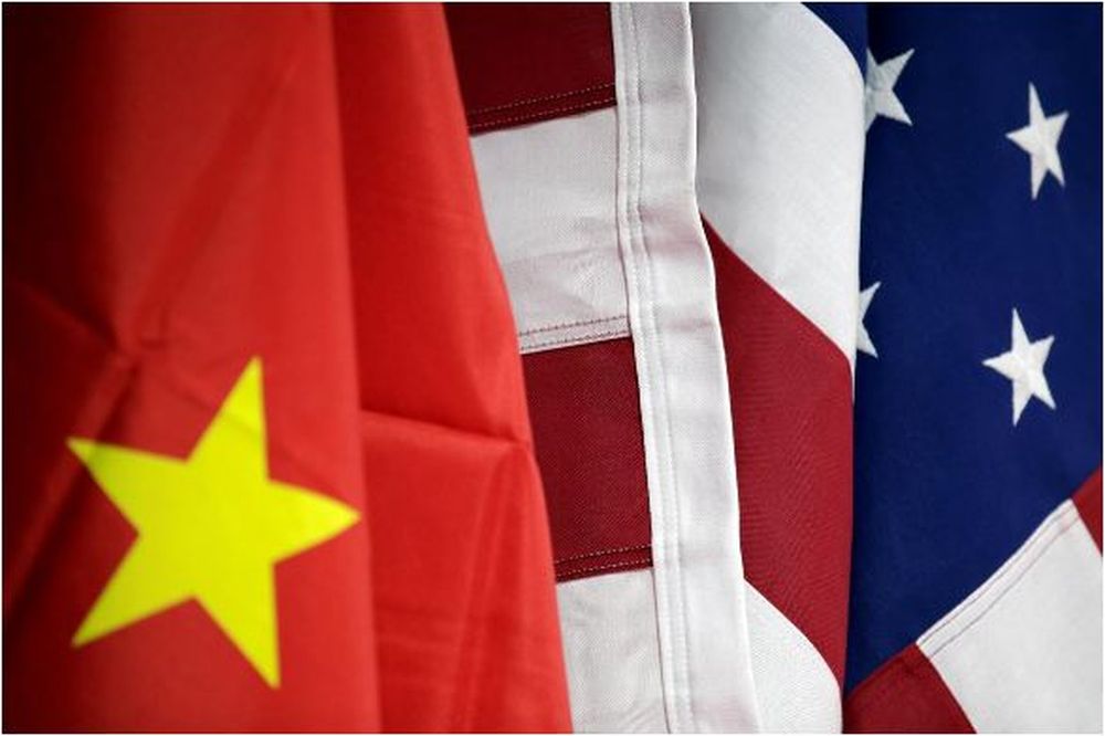 Flags of US and China are displayed at American International Chamber of Commerce (AICC)u00e2u20acu2122s booth during China International Fair for Trade in Services in Beijing, China, May 28, 2019. u00e2u20acu201d Reuters pic