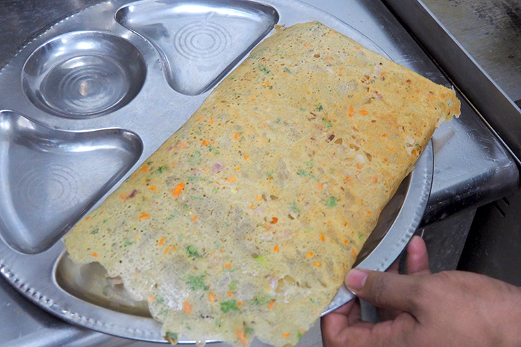 来这家餐厅不容错过的Rava Thosai。-Lee Khang Yi摄-