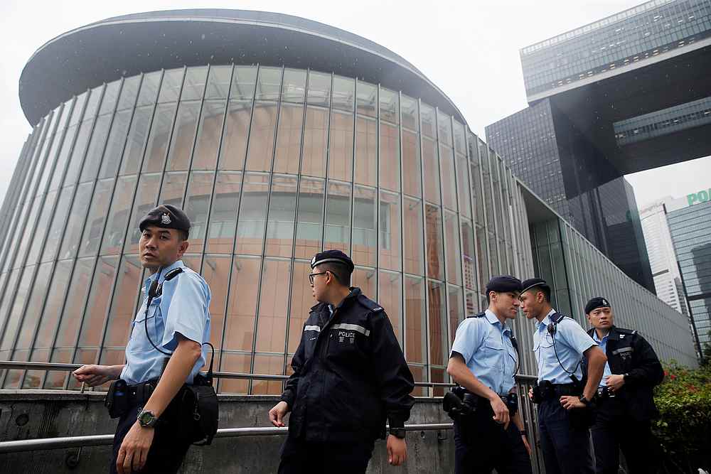 Policemen patrol outside the Legislative Council building ahead of Wednesday's hearing on the extradition bill in Hong Kong June 11, 2019. u00e2u20acu201d Reuters pic