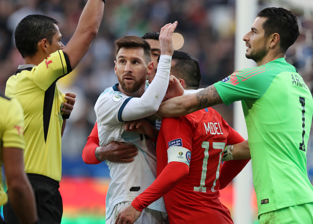Argentina's Lionel Messi and Chile's Gary Medel are shown a red card by referee Mario Diaz de Vivar, July 6, 2019. u00e2u20acu201d Reuters pic