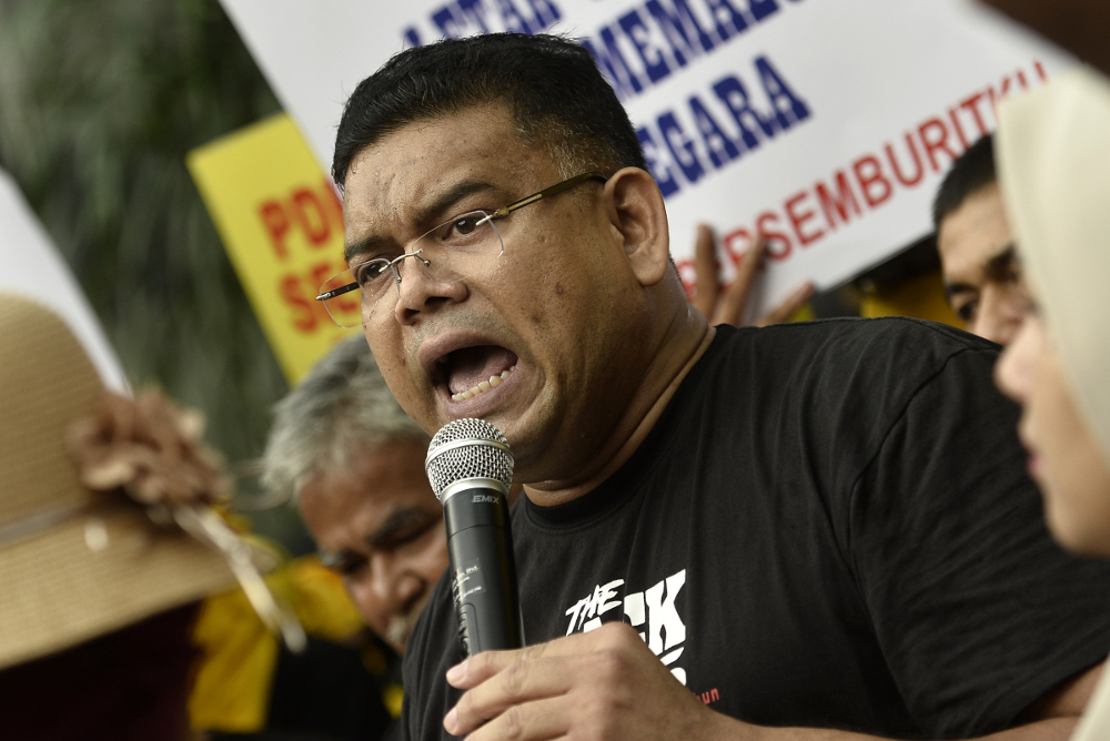 Datuk Lokman Adam speaks during a demonstration demanding the resignation of Datuk Seri Azmin Ali from his position as a cabinet minister in Kuala Lumpur July 6, 2019. u00e2u20acu201d Picture by Miera Zulyana