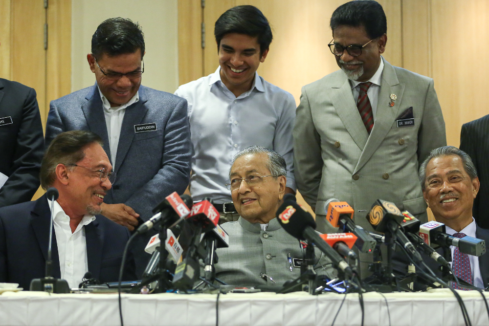 Prime Minister Tun Dr Mahathir Mohamad (centre) speaks during a press conference after chairing the Pakatan Harapan Presidential Council meeting at Yayasan Kepimpinan Perdana in Putrajaya July 8, 2019. u00e2u20acu201d Picture by Yusof Mat Isa