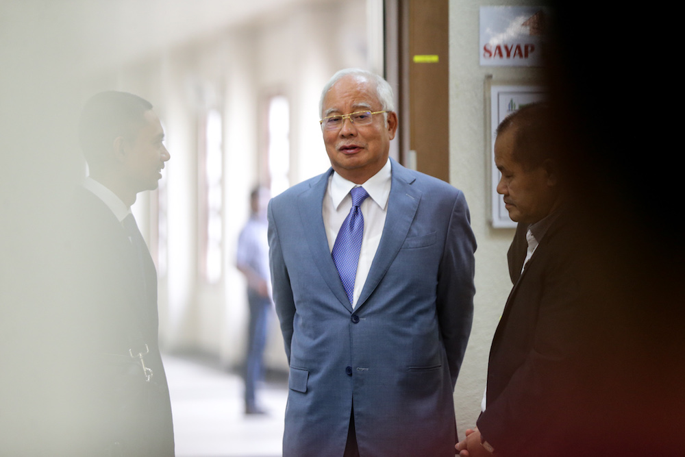 Datuk Seri Najib Razak is seen at the Kuala Lumpur Courts Complex July 18, 2019. u00e2u20acu201d Picture by Ahmad Zamzahuri