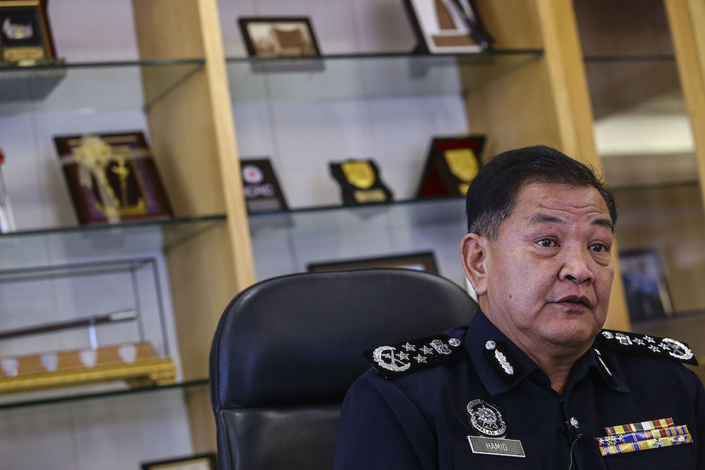 Inspector-General of Police Datuk Seri Abdul Hamid Bador answers questions during an interview with Malay Mail at his office in Bukit Aman Kuala Lumpur July 17, 2019. u00e2u20acu201d Picture by Hari Anggara