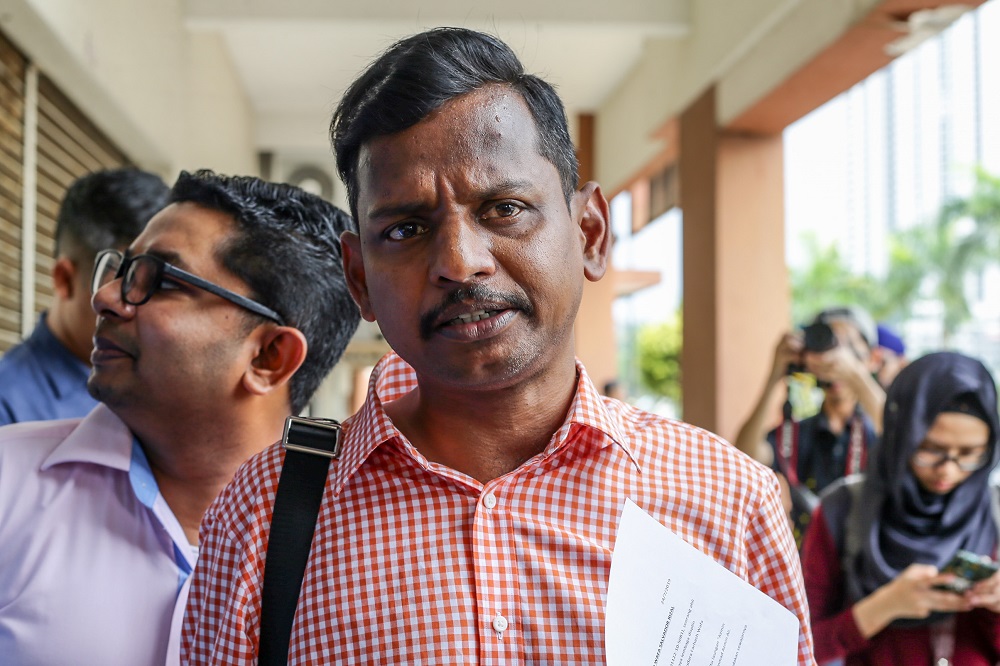 Ampang PKR deputy branch chief D. Nallan speaks to reporters after lodging a report with the partyu00e2u20acu2122s disciplinary board against Perak PKR chief Farhash Wafa Salvador Rizal Mubarak in Kuala Lumpur July 24, 2019. u00e2u20acu201d Picture by Ahmad Zamzahuri