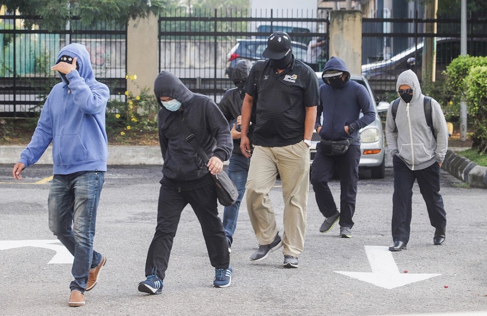 Five Road Transport Department personnel and one Land Public Transport Commission personnel arriving at the Sessions Court in Butterworth July 24, 2019. u00e2u20acu201d Picture by Sayuti Zainudin
