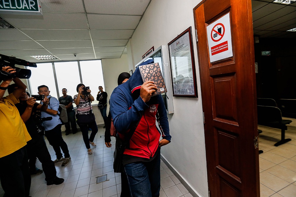 One of the JPJ personnel is seen entering the court room to face graft charges at the Session Court in Butterworth July 26, 2019. u00e2u20acu201d Picture by Sayuti Zainudin