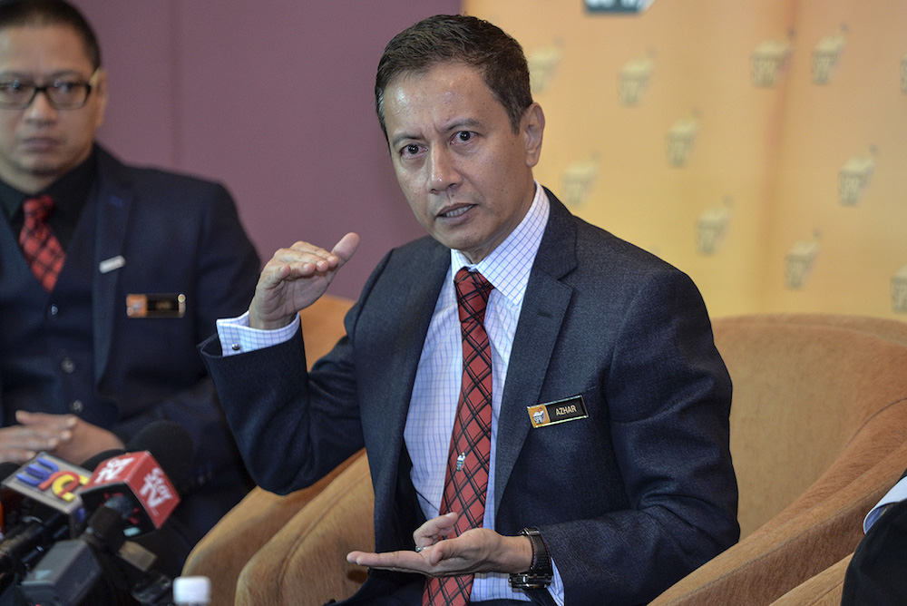Election Commission chairman Azhar Azizan Harun speaks to the media during a press conference at Putrajaya International Convention Centre (PICC) in Putrajaya July 18, 2019. u00e2u20acu201d Picture by Shafwan Zaidon