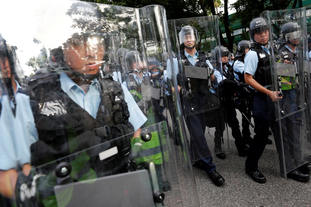 Riot police stand guard during a march at Sheung Shui, a border town in Hong Kong, China July 13, 2019. u00e2u20acu201d Reuters pic