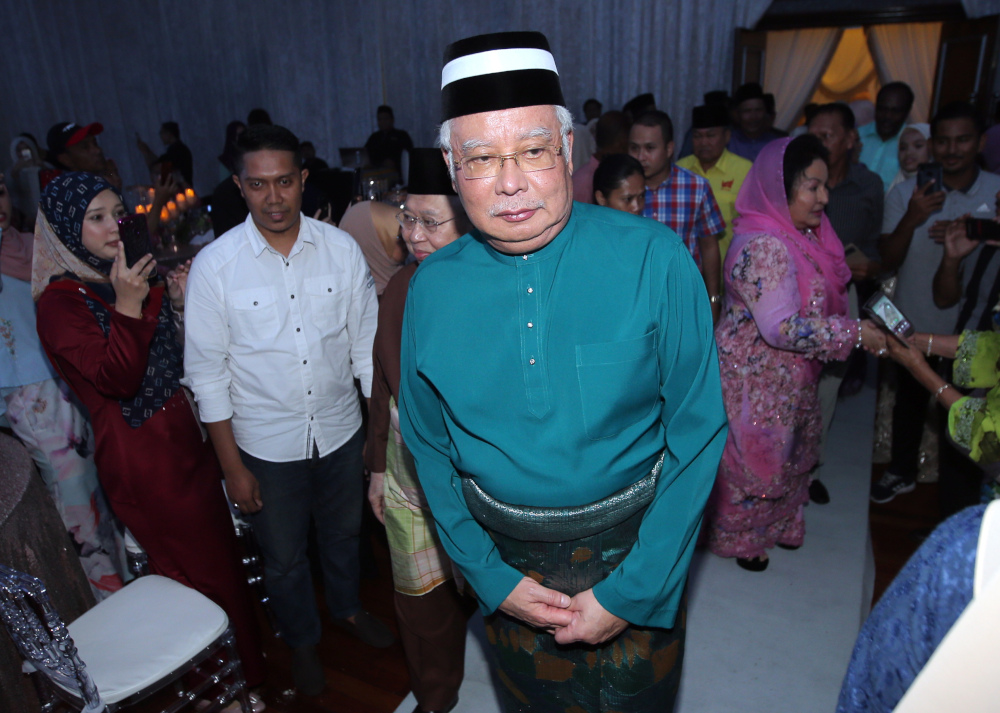Datuk Seri Najib Razak and his wife Datin Seri Rosmah Mansor attend Putra committee member Datuk Hamidah Osmanu00e2u20acu2122s daughteru00e2u20acu2122s wedding reception at Royal Perak Golf Club in Ipoh July 13, 2019. u00e2u20acu201d Picture by Farhan Najib