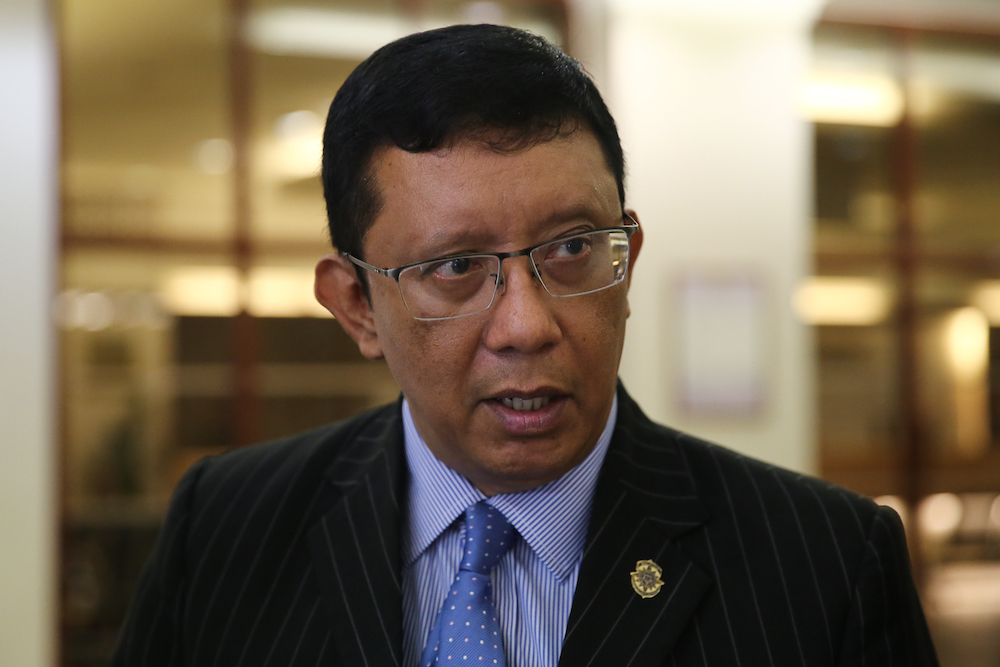 Zamihan Mat Zinu00e2u20acu2122s lawyer Datuk Shaharudin Ali speaks to reporters in the lobby of the Kuala Lumpur Court Complex July 17, 2019. u00e2u20acu201d Picture by Yusof Mat Isa