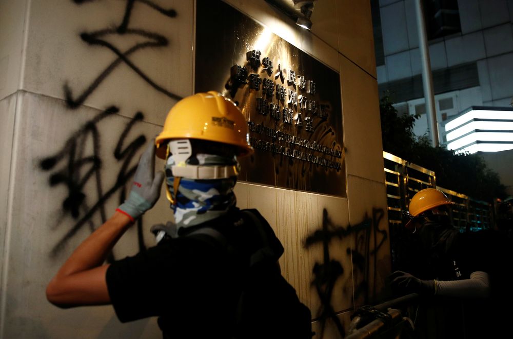 Protesters spray wall of Chinese Liaison Office after a march to call for democratic reforms, in Hong Kong, China July 21, 2019. u00e2u20acu201d Reuters pic