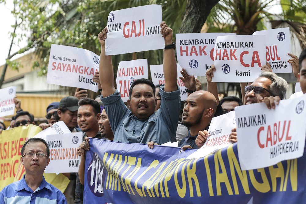 Utusan Malaysia workers protest over unpaid salaries in front of Utusan headquarters in Kuala Lumpur August 19, 2019. u00e2u20acu201d Picture by Ahmad Zamzahuri