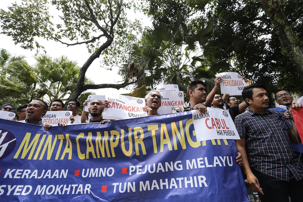 Utusan Malaysia workers protest over unpaid salaries in front of Utusan headquarters in Kuala Lumpur August 19, 2019. u00e2u20acu201d Picture by Ahmad Zamzahuri