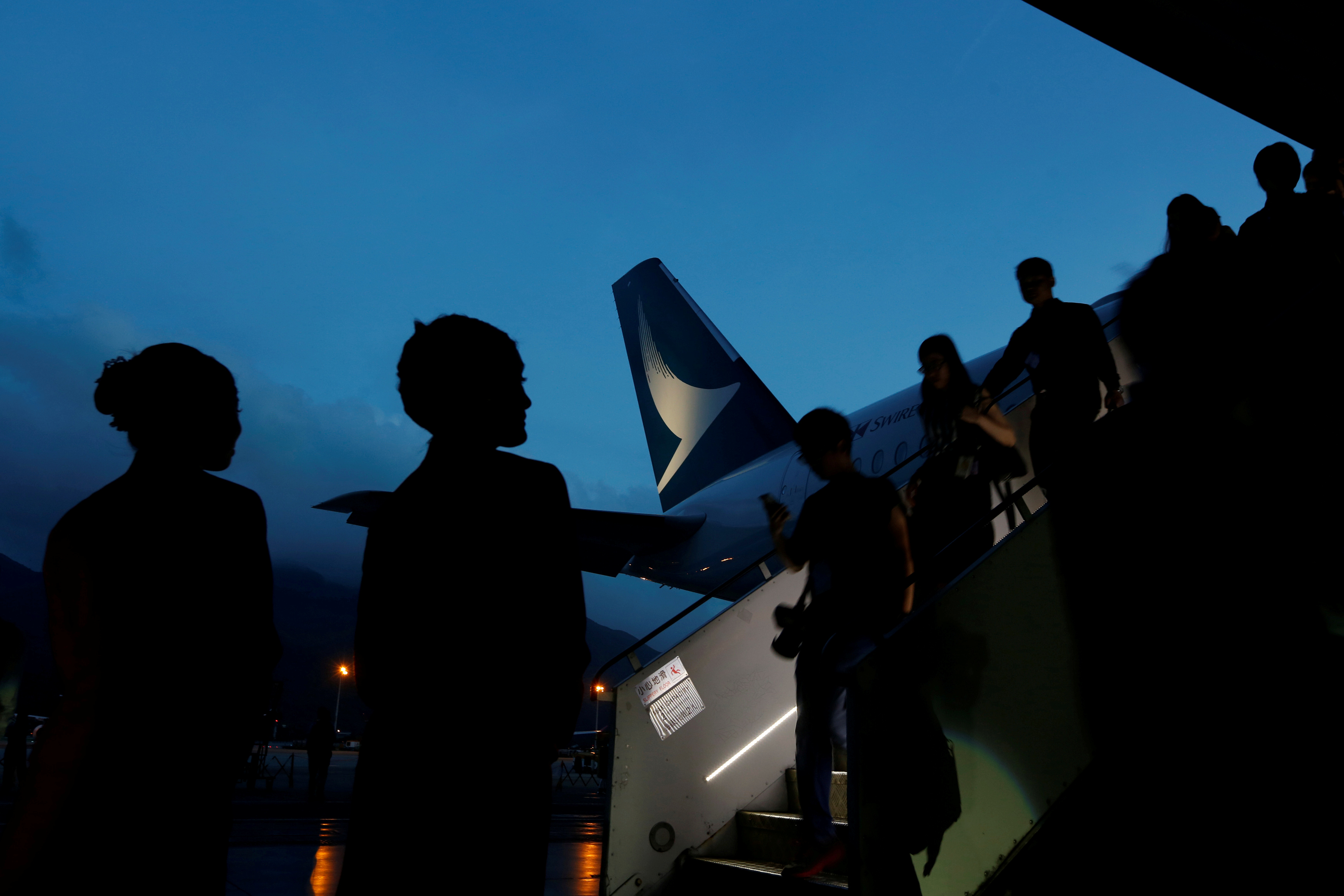 Guests descend from a Cathay Pacific Airways Airbus A350 after a tour of the aircraft cabin at Hong Kong Airport May 30, 2016. u00e2u20acu201d Reuters pic